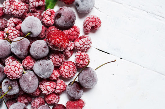 Summer fresh berries, healthy food, white wooden background.